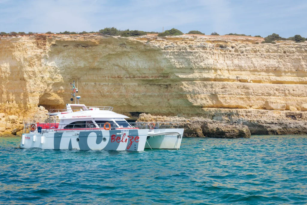 Catamaran boat tour departing Vilamoura Marina for Benagil Caves brunch trip