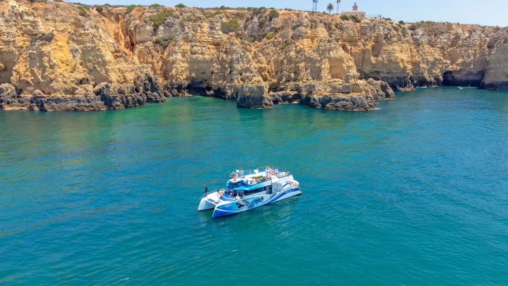 Vilamoura Dolphin & Benagil Cave Tour | 2026 Guide & Booking Vilamoura Dolphin and Caves Algarve Catamaran
